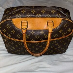 $2130 LV MONOGRAM BOWLER DEAUVILLE (MINOR TEAR IN ZIPPER)